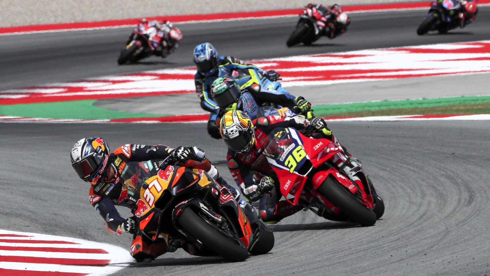 Ogura at the tail of a group queued up behind Acosta, 2026 Catalan MotoGP.