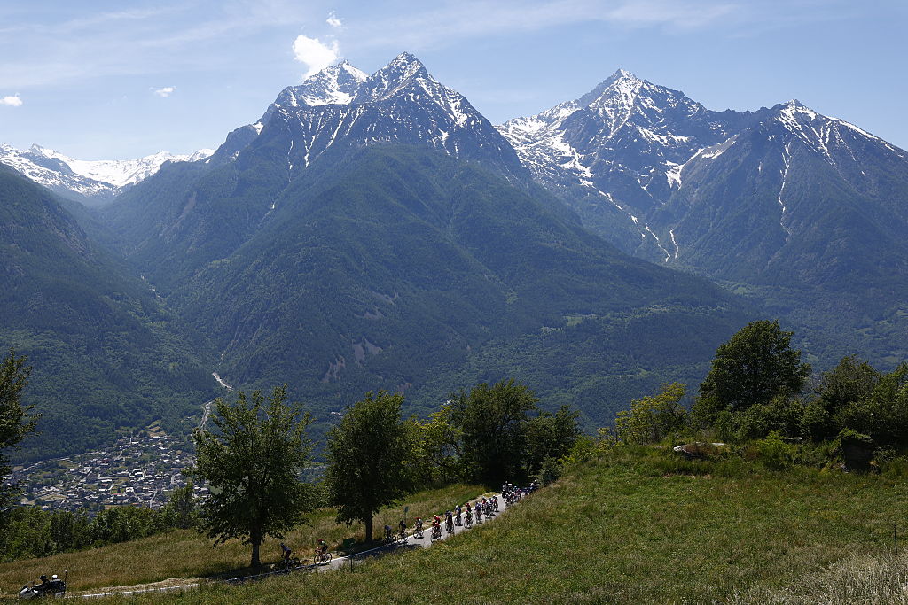 Riders start to climb during the 14th stage of the Giro d'Italia 2026 - Tour of Italy cycling race between Aosta and Pila (Gressan), Italy, on May 23, 2026. (Photo by Luca Bettini / AFP)