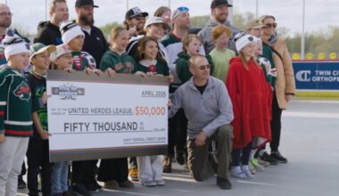 NFCU ups donation to the United Heroes League