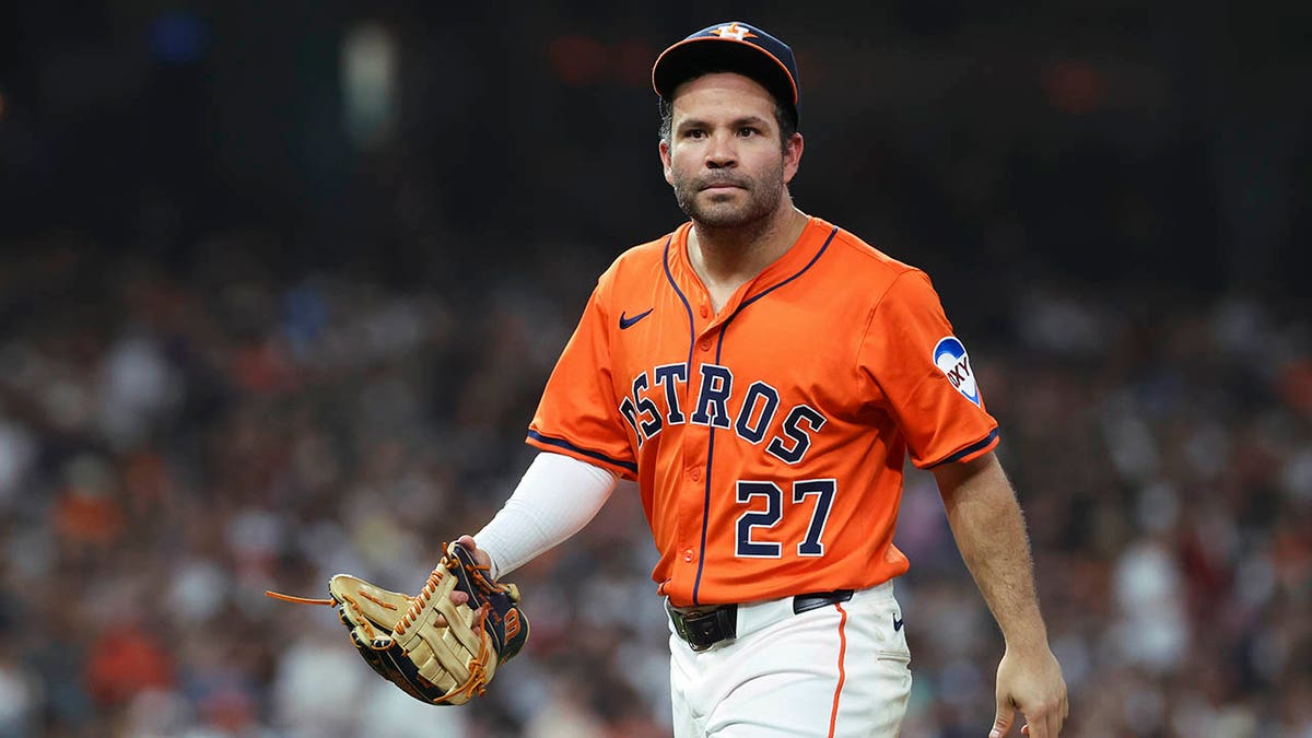 Houston Astros left fielder Jose Altuve walking off the field at Daikin Park.
