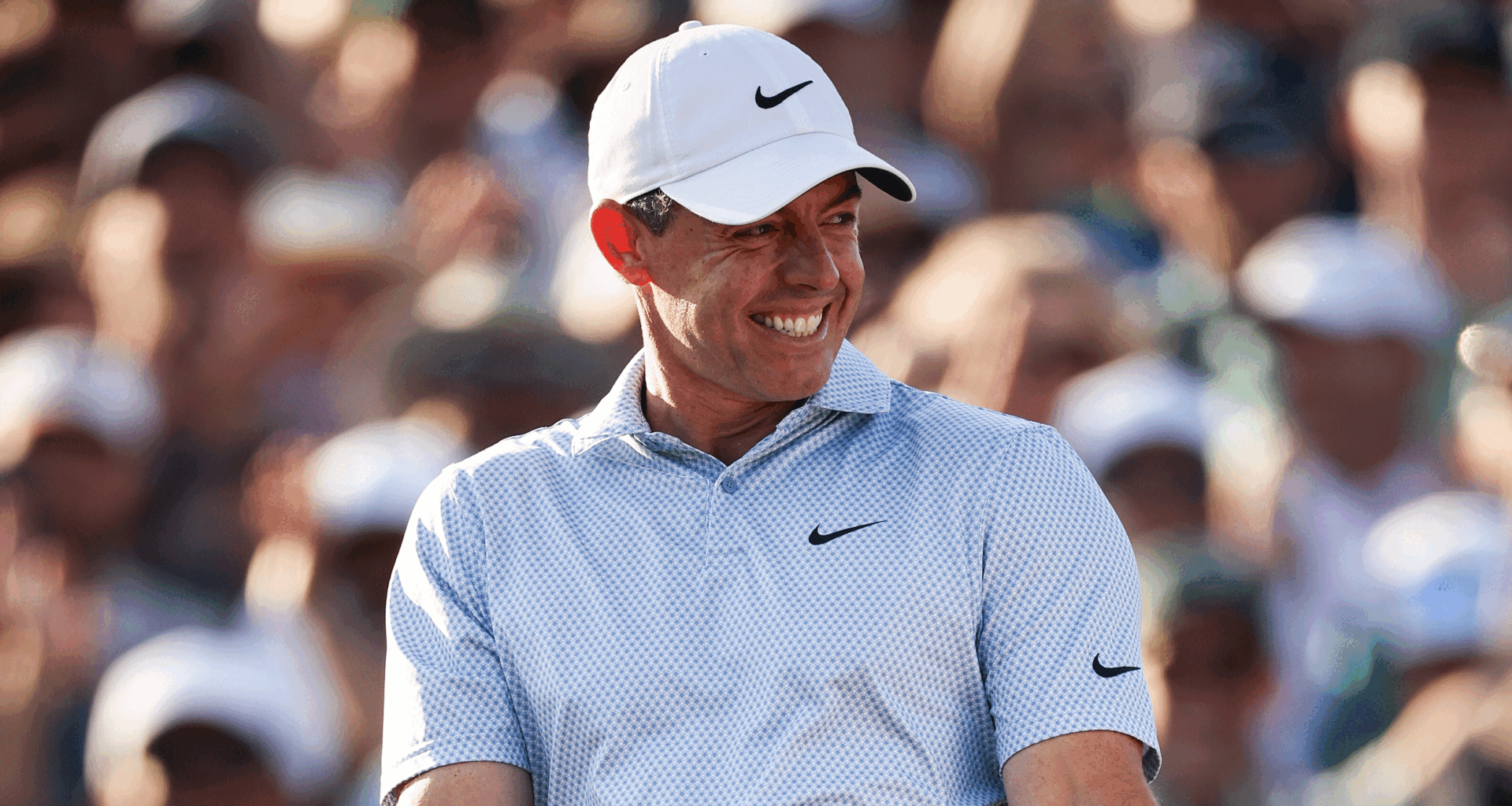 Rory McIlroy smiles after winning The Masters in 2026