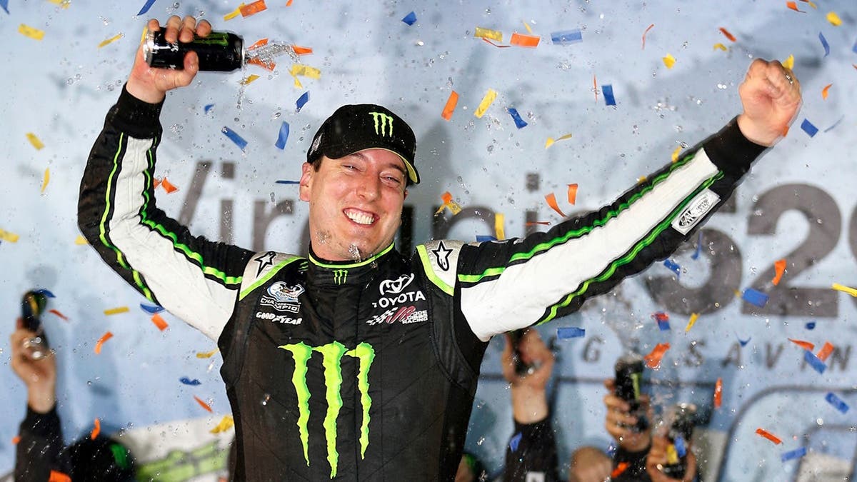 Kyle Busch celebrating in Victory Lane at Richmond International Raceway
