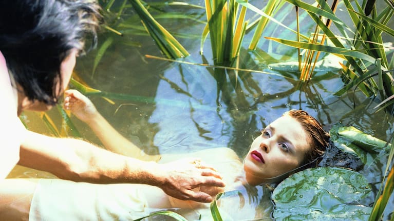 Kylie gained credibility with a new audience when she collaborated with "serious" artists such as Nick Cave. The pair are pictured making a video in 1995.