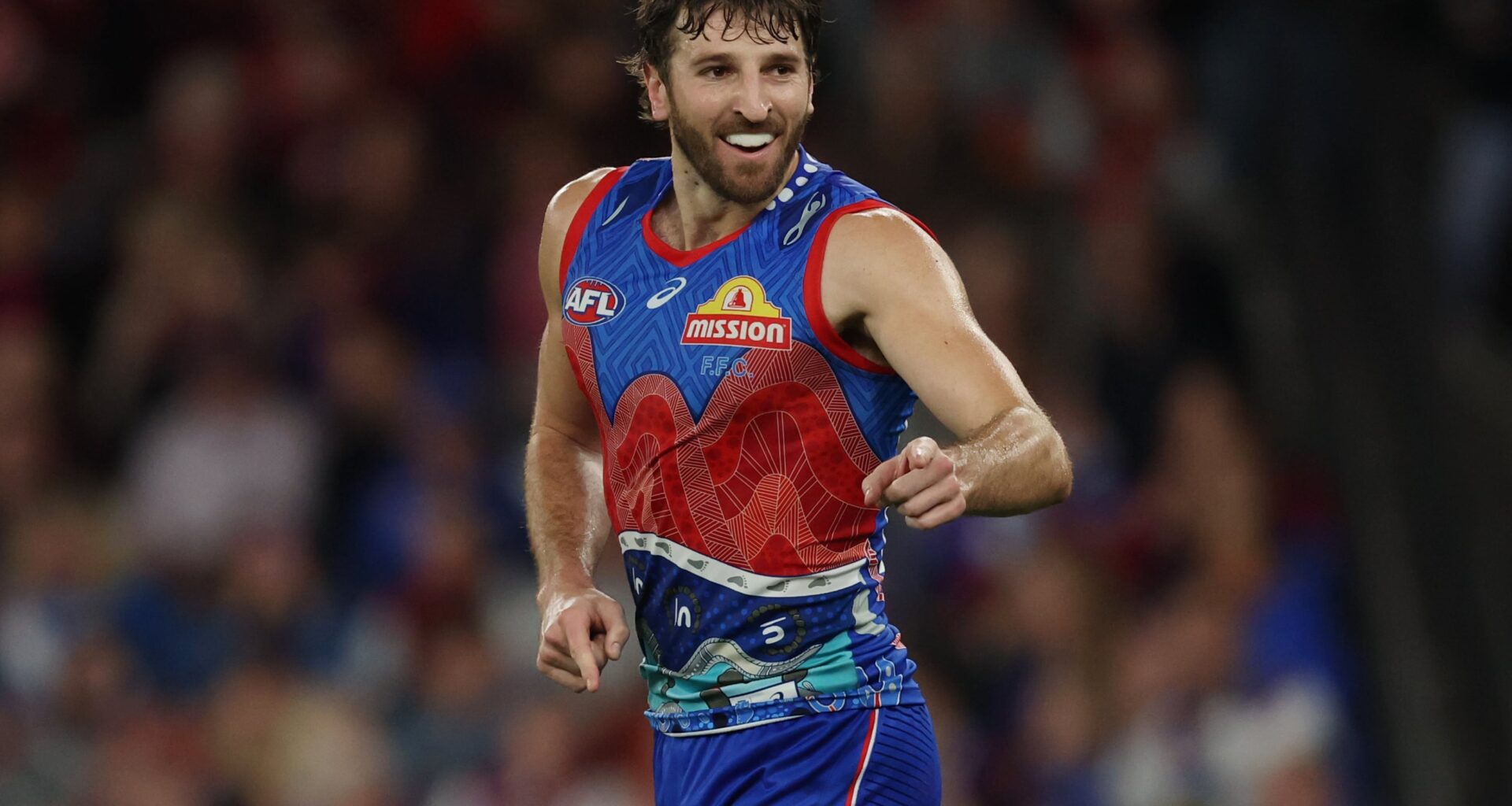 Dogs hold off Demons in thriller for vital win