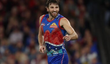 Dogs hold off Demons in thriller for vital win