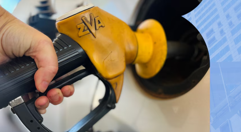 A close up of someone filling up their car with fuel