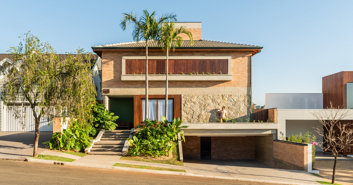 lima house carves open living spaces around a tropical garden in são paulo