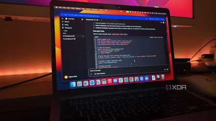A MacBook air connected to a monitor running DeepSeek-R1 locally