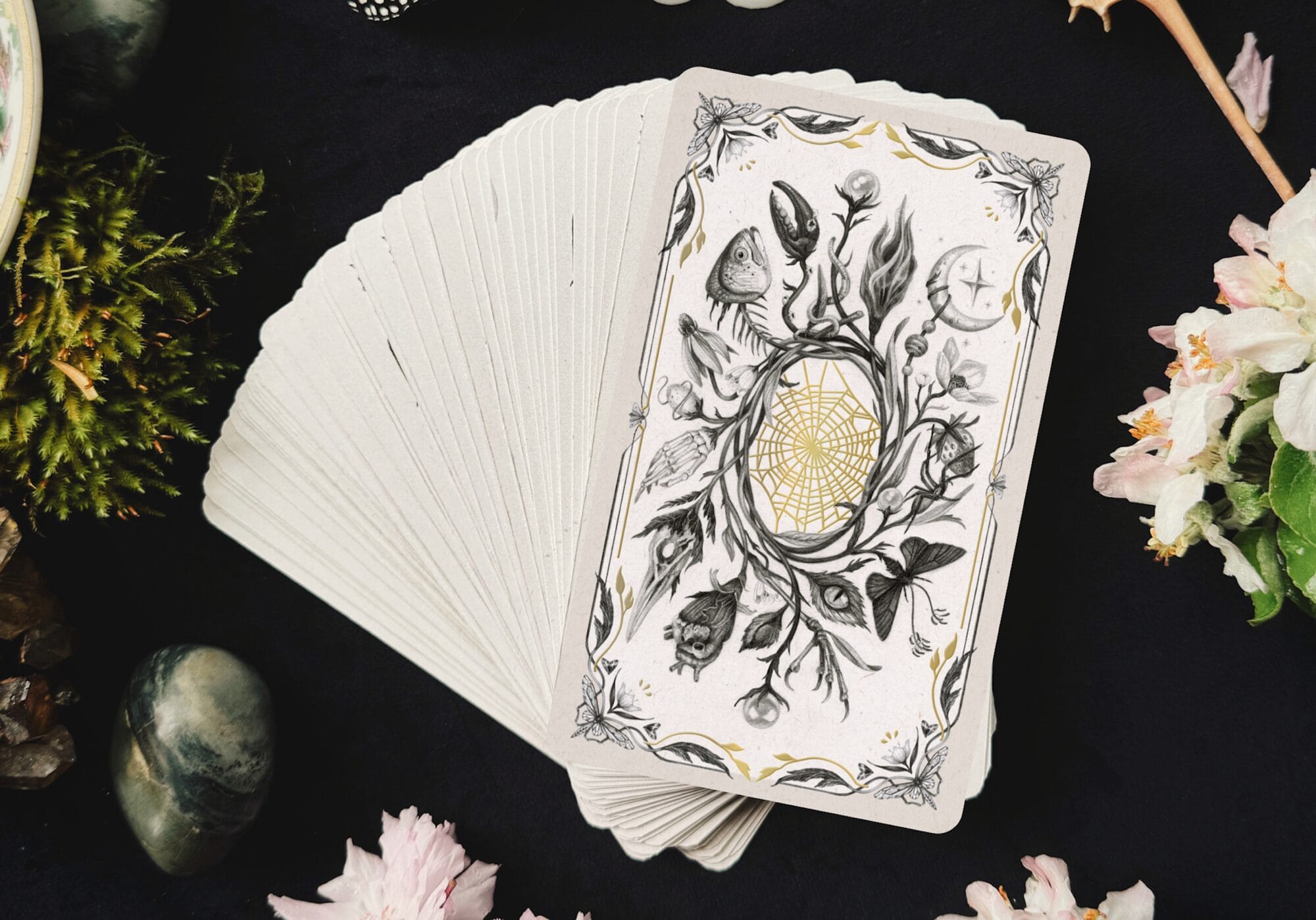 a collection of oracle cards on a table