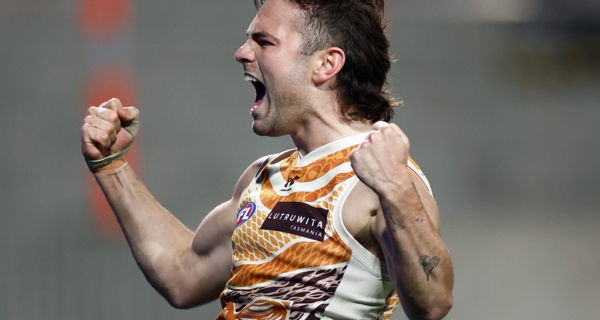 Hawks fire up after slow start to keep Crows at bay