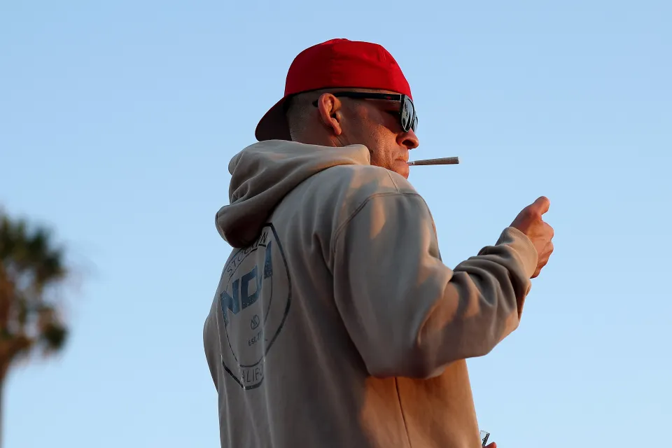 Nate Diaz smoking a joint at an open workout