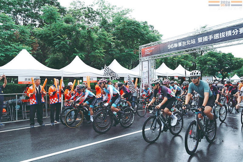 Cyclists race, officials sign partnerships
