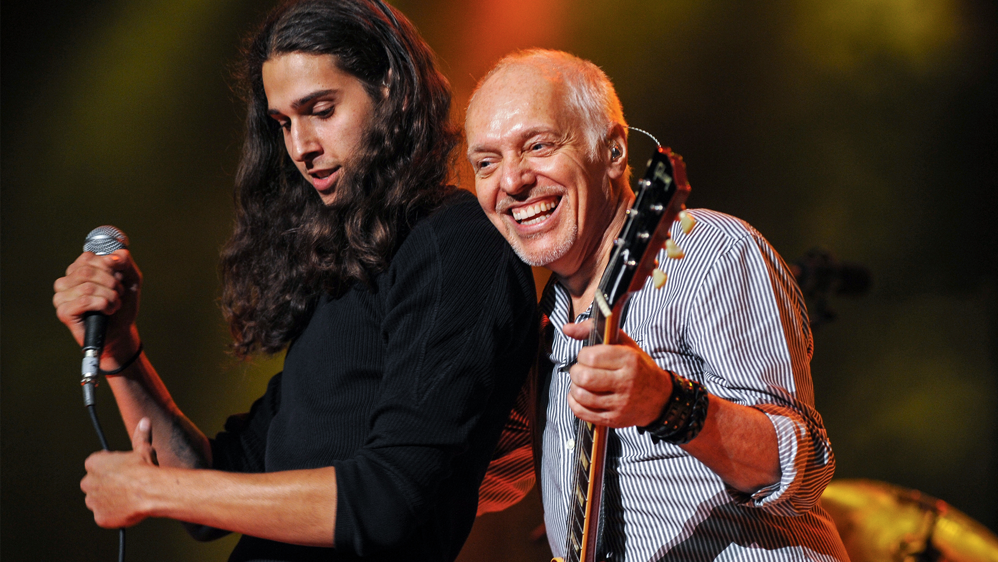 Peter Frampton and his son Julian perform at the Greek Theatre in Los Angeles during his 35th Anniversary tour, July 20, 2011.