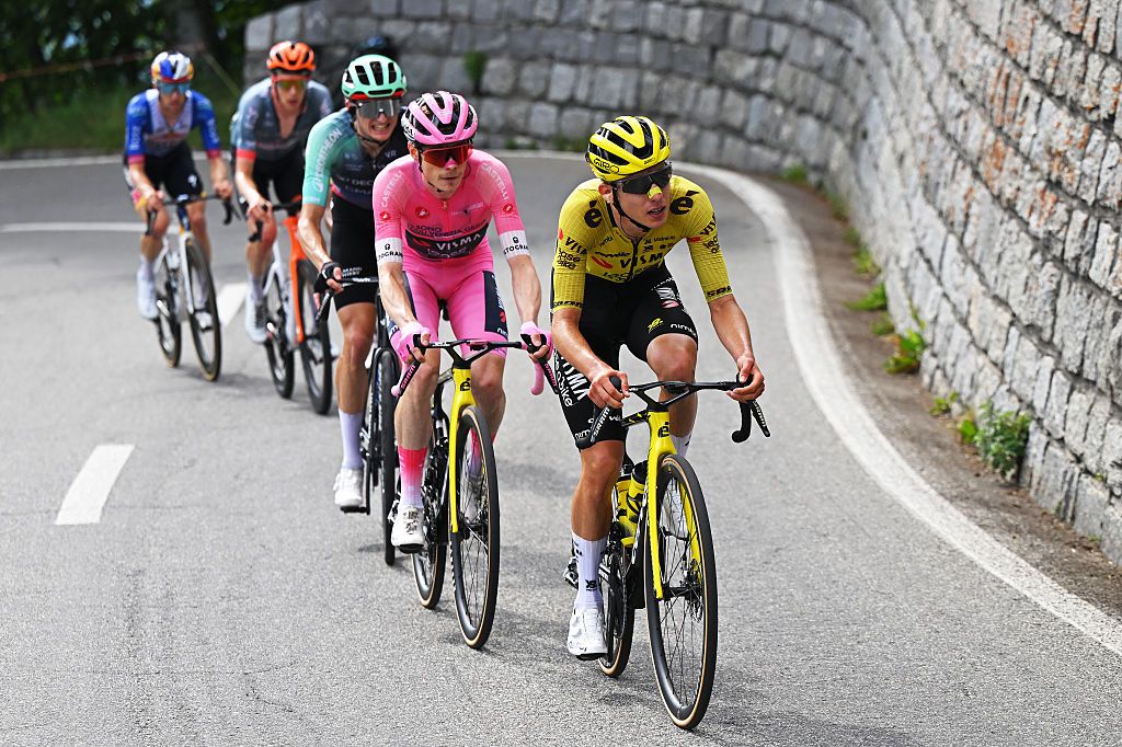 CARI, SWITZERLAND - MAY 26: (L-R) Jonas Vingegaard of Denmark - Pink Leader Jersey and Davide Piganzoli of Italy and Team Visma