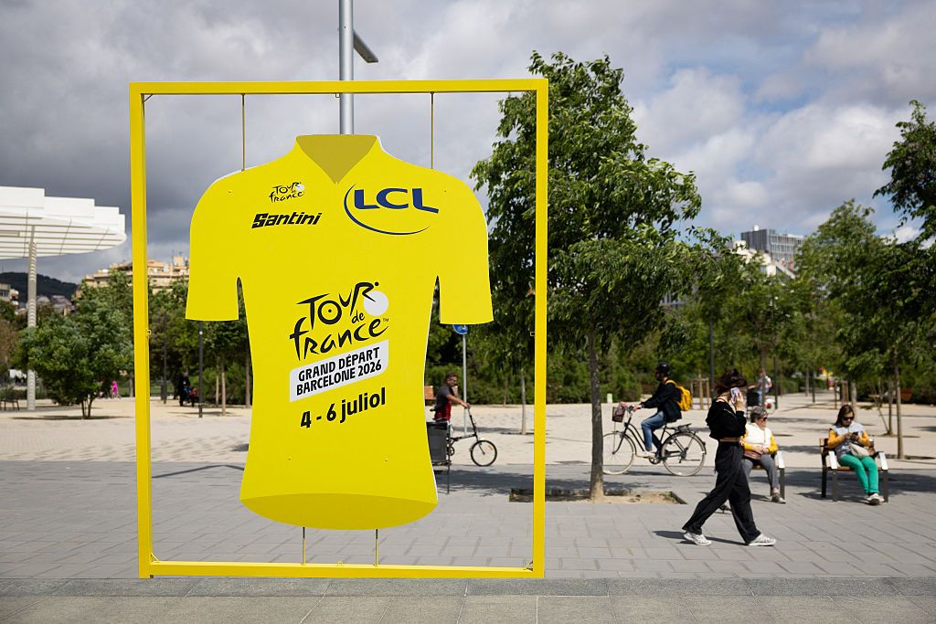 A display shaped like the Tour de France leader's yellow jersey promoting the race's 'Grand Depart' is pictured in Barcelona on May 7, 2026.