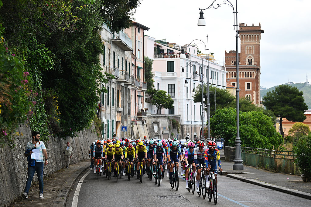 A general view of the peloton passing through Salerno city during the 109th Giro d'Italia 2026, Stage 6 a 141km stage from Paestum to Naples