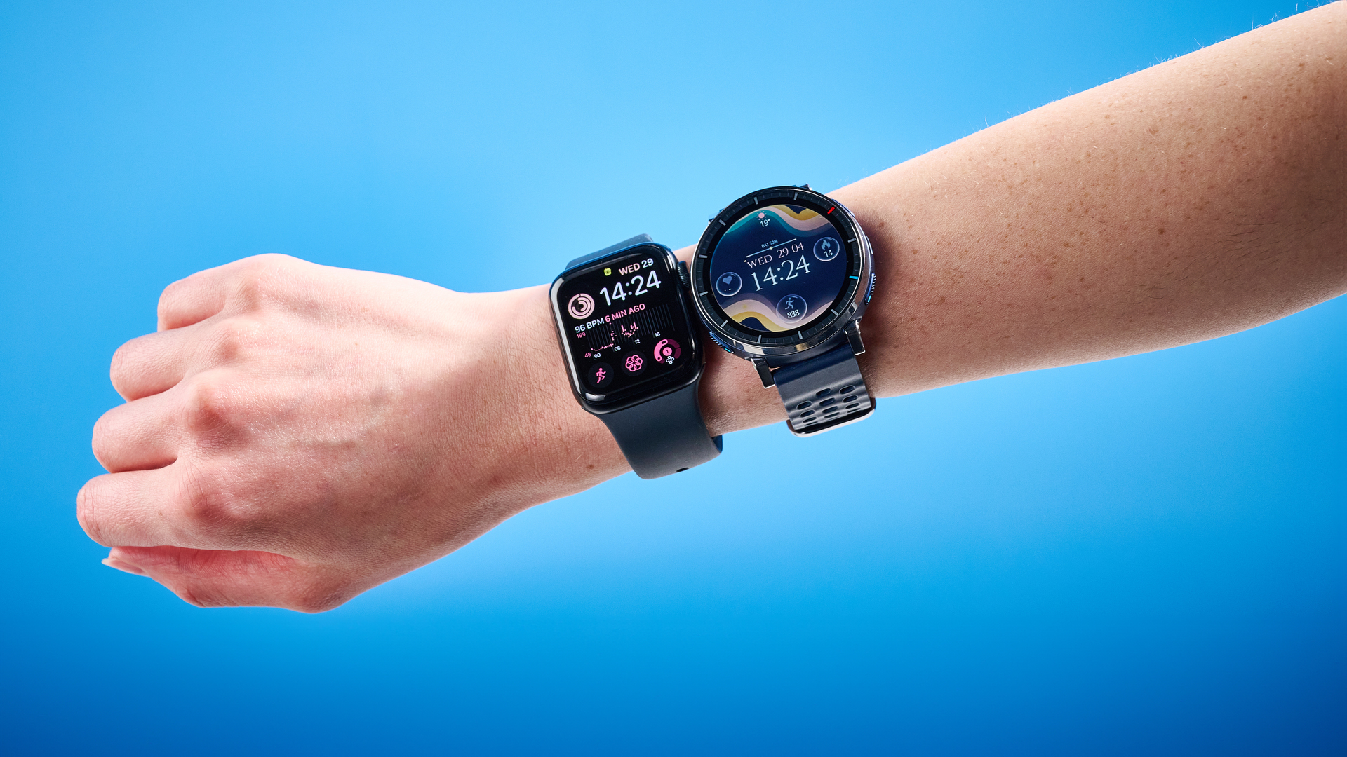 the apple watch se 3 photographed beside the amazfit active 3 premium