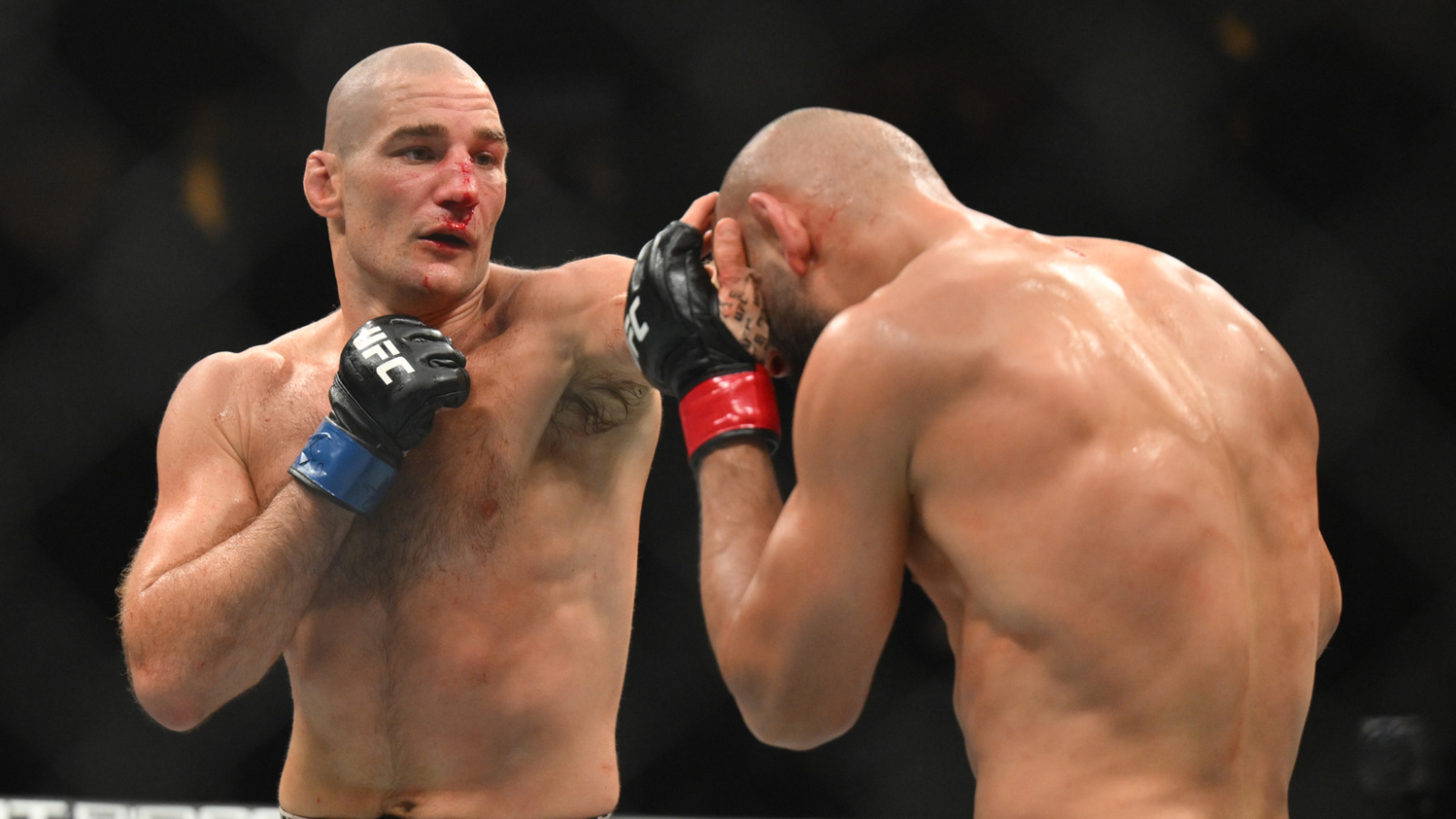 Sean Strickland hands Khamzat Chimaev first loss, reclaims belt