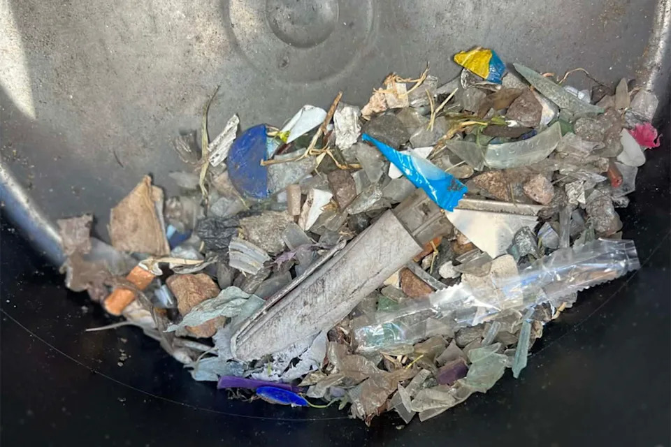 The glass and other sharp objects removed from the field.