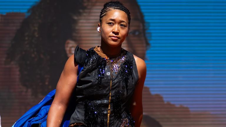 Naomi Osaka walks out for her French Open round one match on May 26