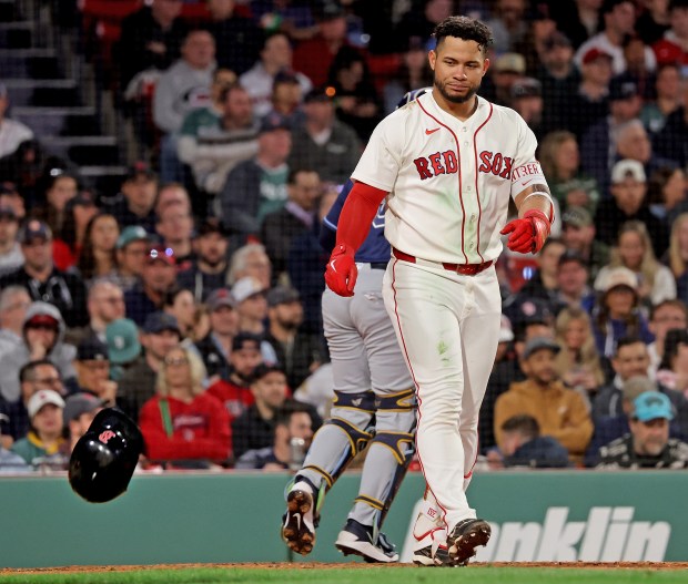Boston, MA - May 7 - Boston Red Sox first baseman Willson Contreras (40) throws his helmet after striking out during the fifth inning at Fenway Park. (Photo By Matt Stone/Boston Herald).