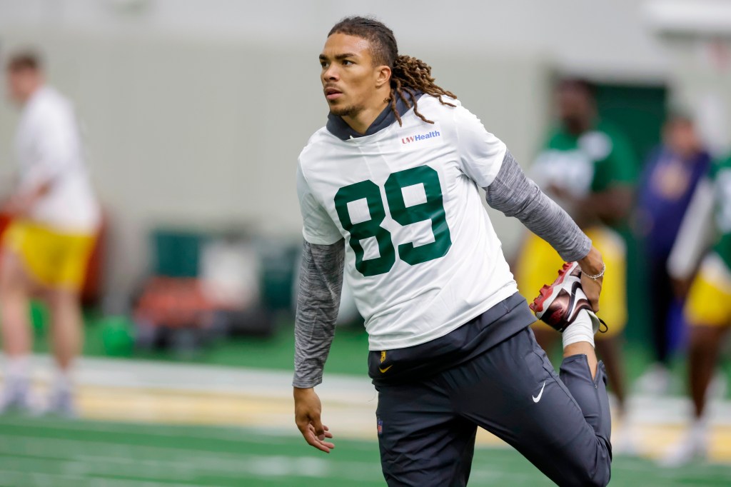 Green Bay Packers' Chase Claypool (89) stretching during rookie minicamp.