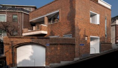 red brick and zinc reshape a 1970s house in seoul