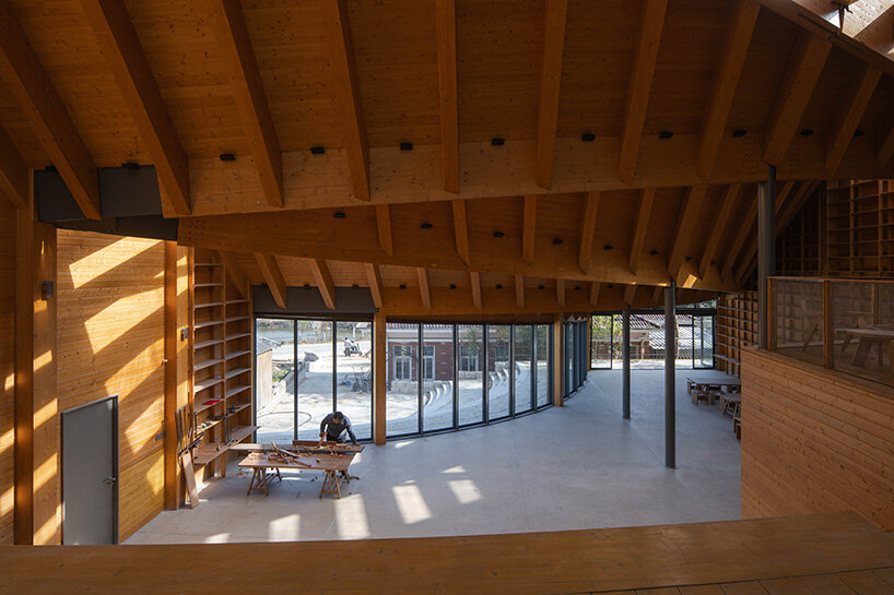 sweeping timber roof crowns a workshop reviving rural craft traditions in china - 8