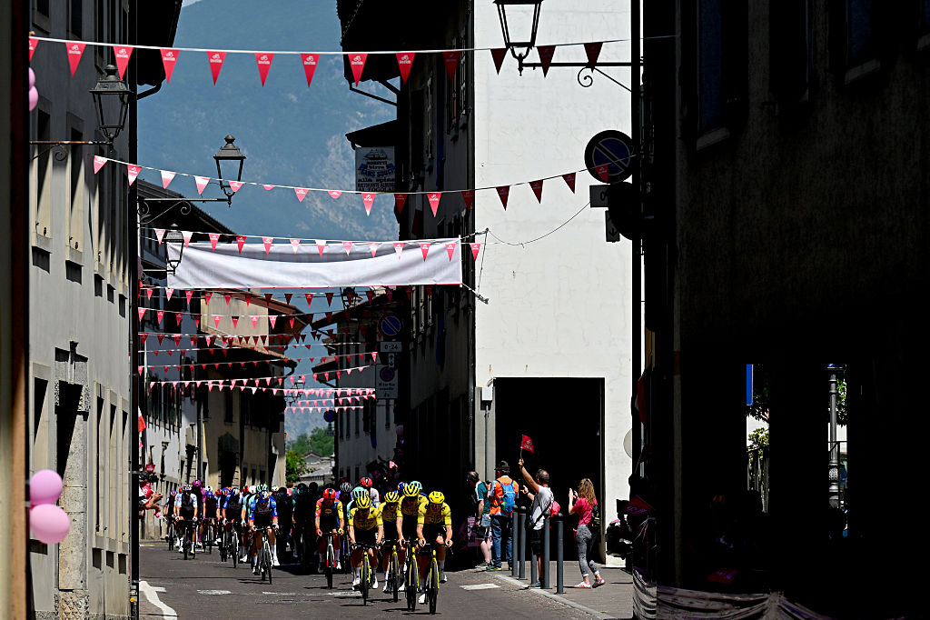 PIANCAVALLO, ITALY - MAY 30: A general view of the peloton passing through a Artegna village during the 109th Giro d&amp;apos;Italia 2026, Stage 20 a 200km stage from Gemona del Friuli to Piancavallo 1289m / #UCIWT / on May 30, 2026 in Piancavallo, Italy. (Photo by Tim de Waele/Getty Images)