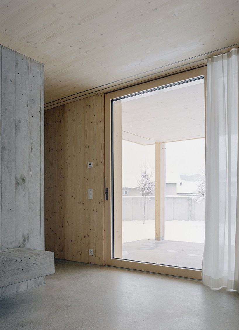 the tower house explores vertical living through prefabricated timber design 6