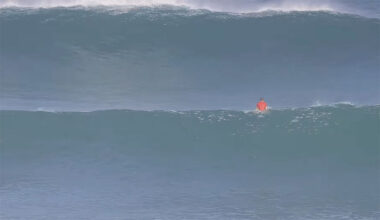 Surfer sitting at Uluwatu