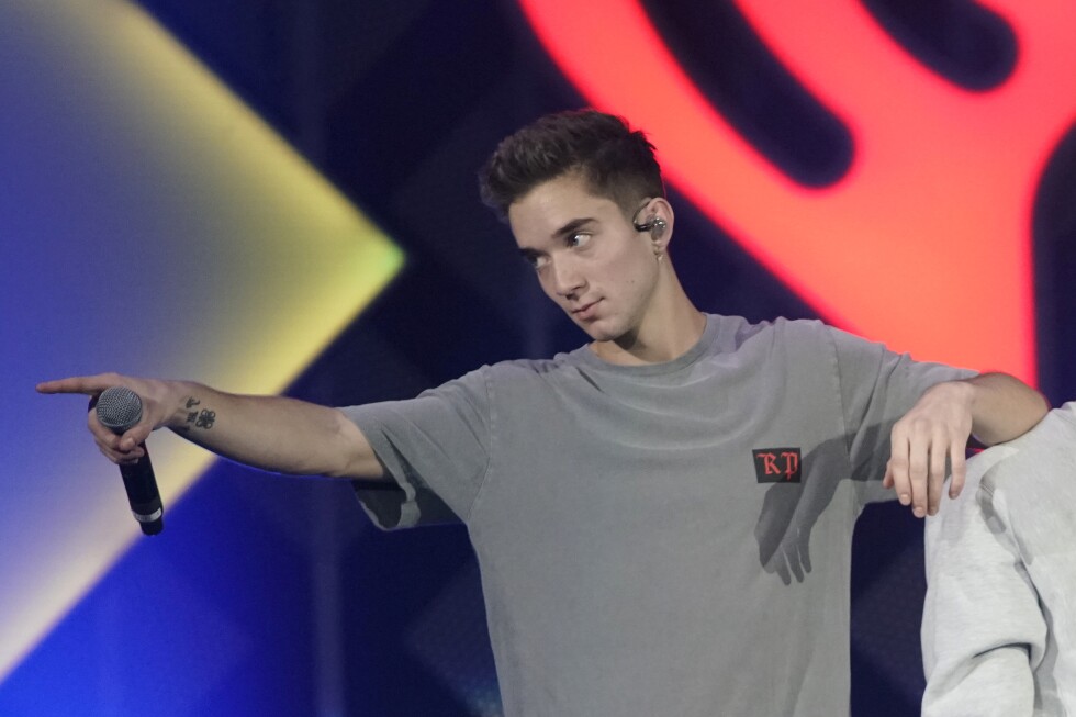Former girlfriend of Why Don't We member charged in dark web hitman plot