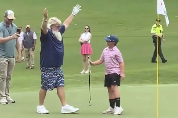 John Daly picks kid out of crowd to hit putt after knocking it close, kid drains it like a pro – Australian Golf Digest