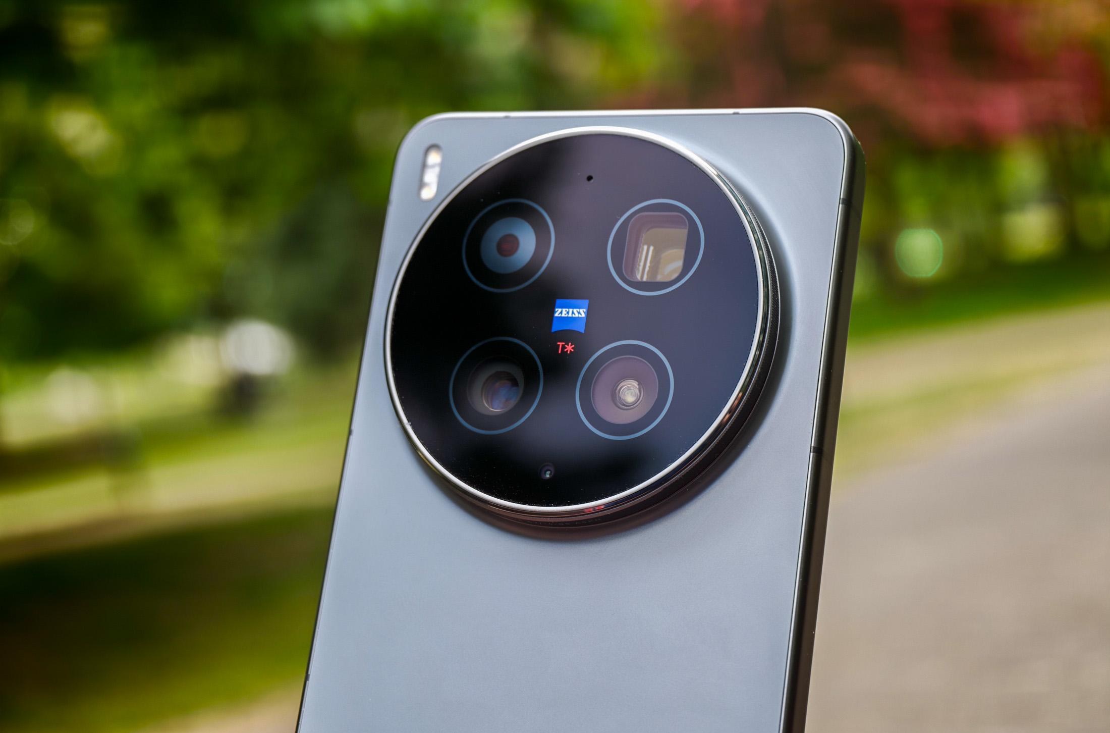 Photo of the Vivo X300 Ultra camera module with blurred trees behind it