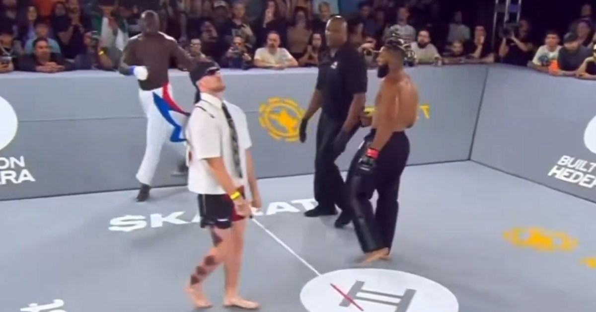 Video: Winged C interrupts Karate Combat fight, gets punched following event