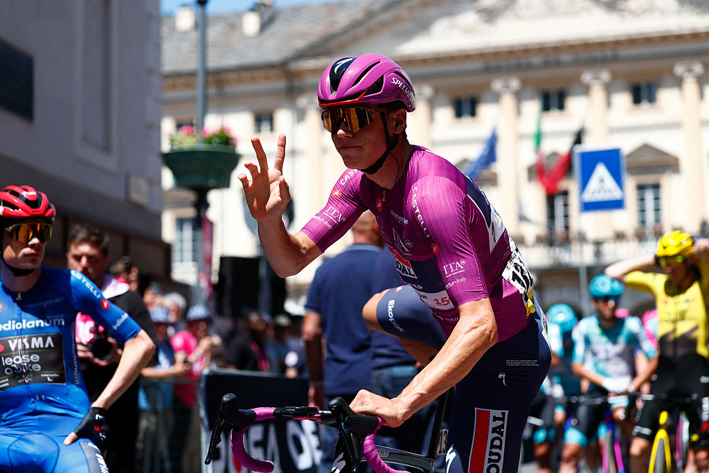 Soudal Quick-Step French rider Paul Magnier wearing the best sprinter's cyclamen jersey arrives to take the 14th stage of the Giro d'Italia 2026
