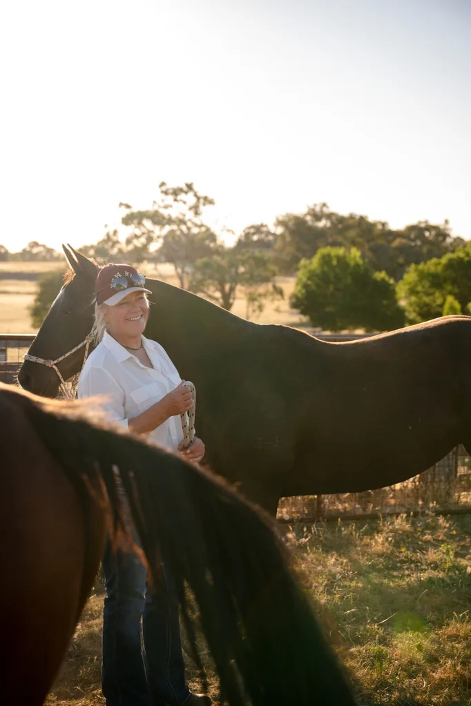Belinda Siejka with a horse on her Bathurst property