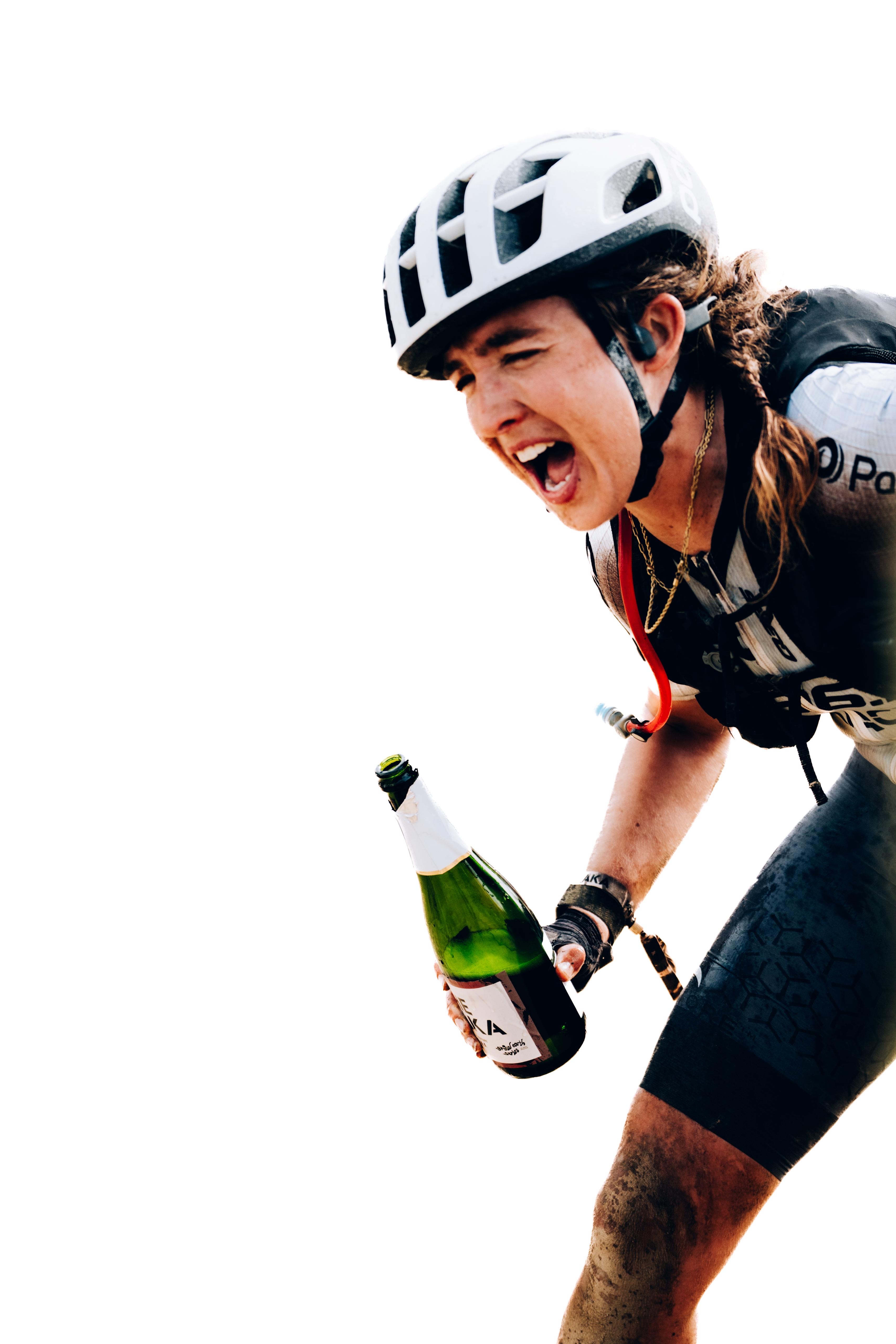 Maddy Nuts sprays the bubbly after winning the Traka 560