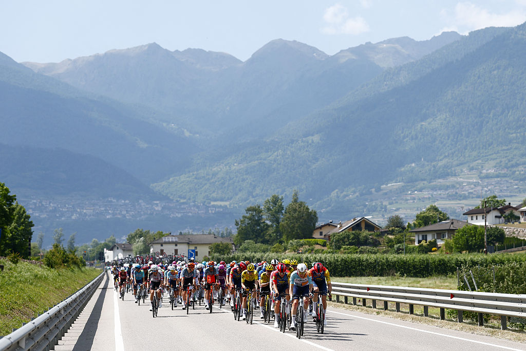 The pack rides during the 18th stage of the Giro d'Italia 2026 - Tour of Italy cycling race between Fai della Paganella and Pieve di Soligo, Italy, on May 28, 2026. (Photo by Luca Bettini / AFP)