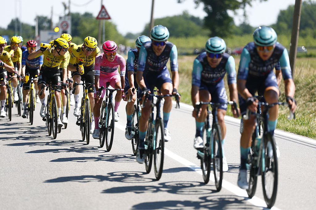 Pink Jersey Bahrain - Victorious Portuguese rider Afonso Eulalio rides in the pack during the 13th stage of the Giro d'Italia 2026 - Tour of Italy cycling race between Alessandria and Verbania, Italy, on May 22, 2026. (Photo by Luca Bettini / AFP)