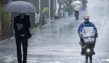 Tropical storm Jangmi batters Japan, cuts power to 60,000 homes