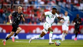 Chiedozie Ogbene of Republic of Ireland in action against Liam Millar of Canada during the international friendly match between Canada and Republic of Ireland at Stade Saputo in Montreal, Canada.