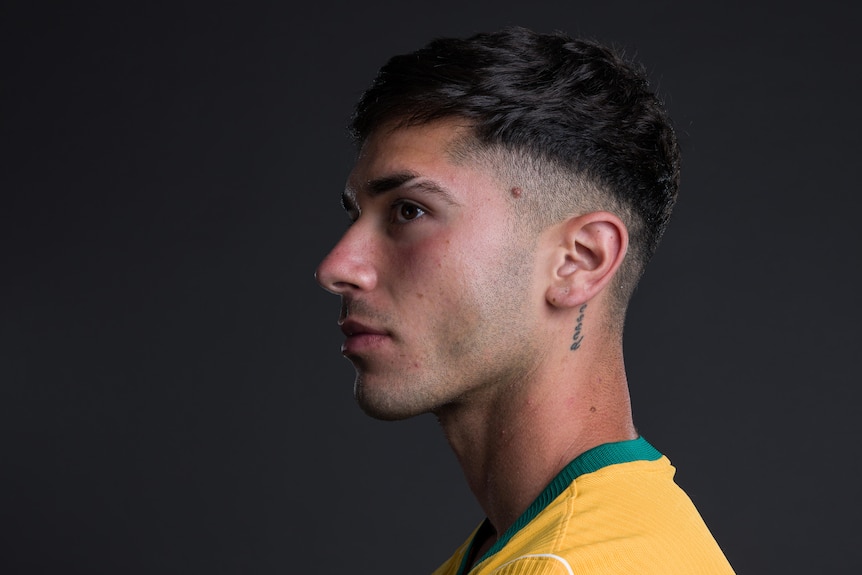 Cristian Volpato poses for a portrait at an official photography session