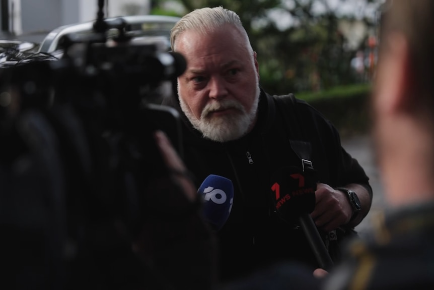 Shock jock Kyle Sandilands addresses media.