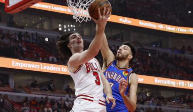 Oct 26, 2024; Chicago, Illinois, USA; Chicago Bulls guard Josh Giddey (3) goes to the basket against Oklahoma City Thunder forward Chet Holmgren (7) during the first half at United Center. Mandatory Credit: Kamil Krzaczynski-Imagn Images