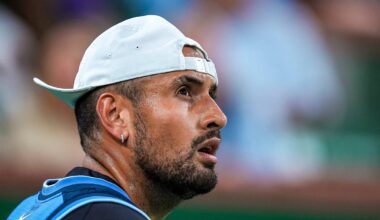 Nick Kyrgios looks up at the video boards before a point