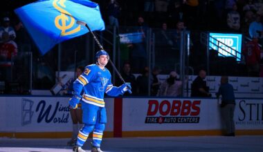 Mar 24, 2026; St. Louis, Missouri, USA; St. Louis Blues right wing Jimmy Snuggerud (21) salutes the fans after he was named second star of the game after a victory over the Washington Capitals at Enterprise Center. Mandatory Credit: Jeff Curry-Imagn Images