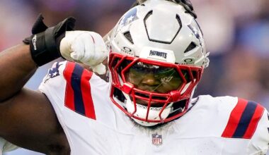 New England Patriots defensive end Milton Williams (97) celebrates sacking Tennessee Titans quarterback Cam Ward (1) during the third quarter at Nissan Stadium in Nashville, Tenn., Sunday, Oct. 19, 2025.