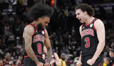 Mar 27, 2025; Chicago, Illinois, USA; Chicago Bulls guard Coby White (0) celebrates his three point basket against the Los Angeles Lakers with guard Josh Giddey (3) during the second half at United Center. Mandatory Credit: David Banks-Imagn Images