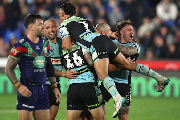 The Sharks celebrate Braydon Trindall’s match-winning field goal.
